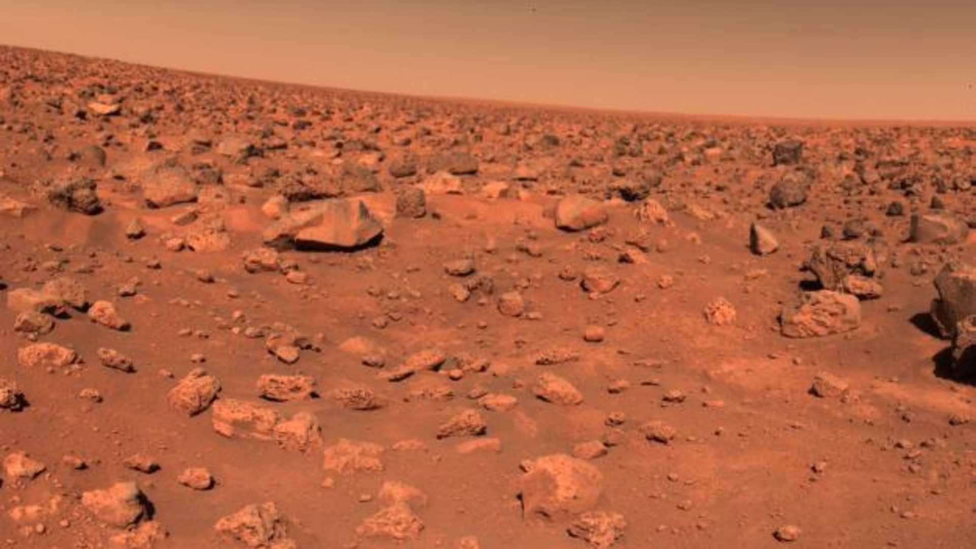 One of the earliest full-color images of the Martian surface, capturing its rust-red soil.