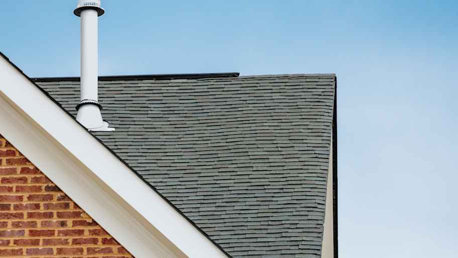 Asphalt shingles and vent on roof
